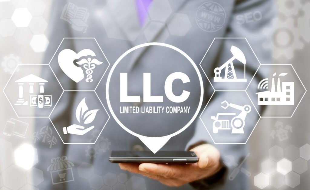 Limited Liability Company (LLC) Business Industry Healthcare concept. Man offers smartphone with limited liability company text icon on a virtual interface. how is an LLC taxed